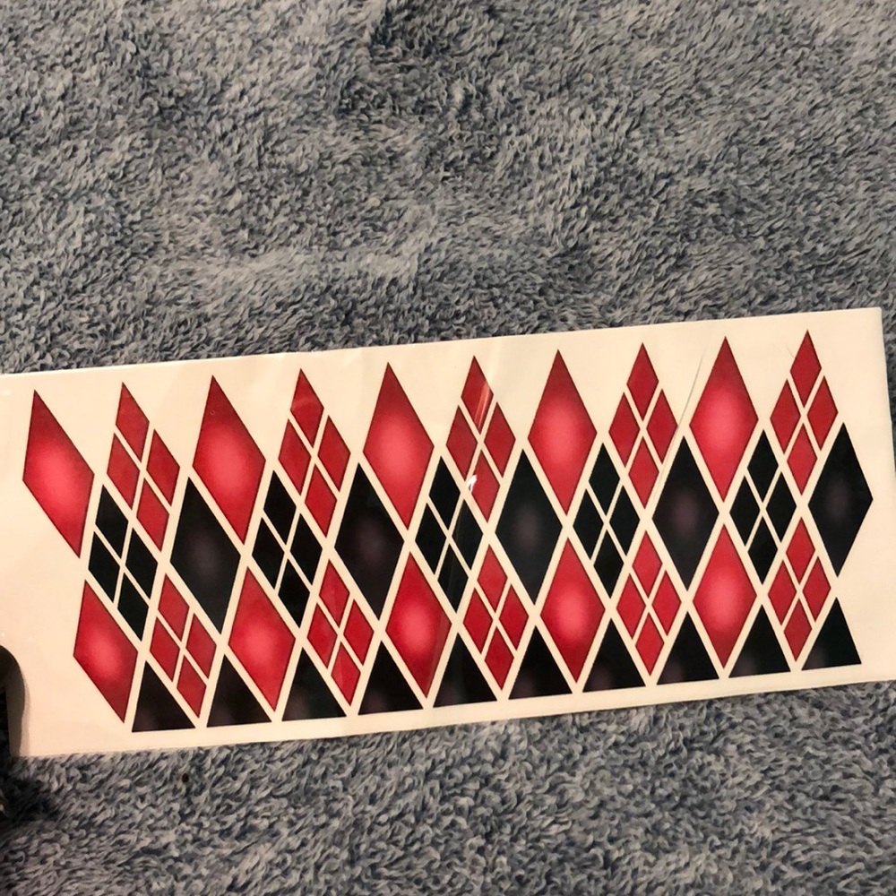 Harley Quinn wrist tattoo